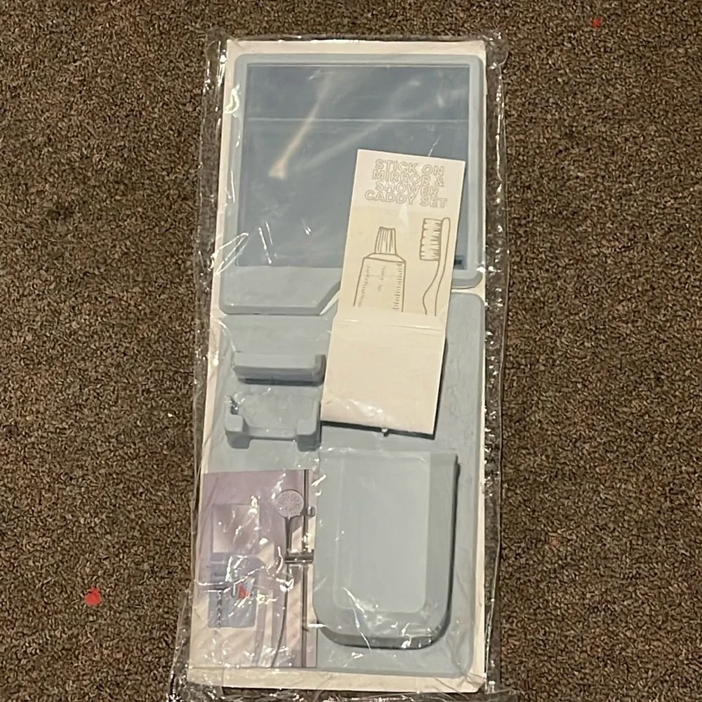 NWOT stick on mirror shower and caddy set